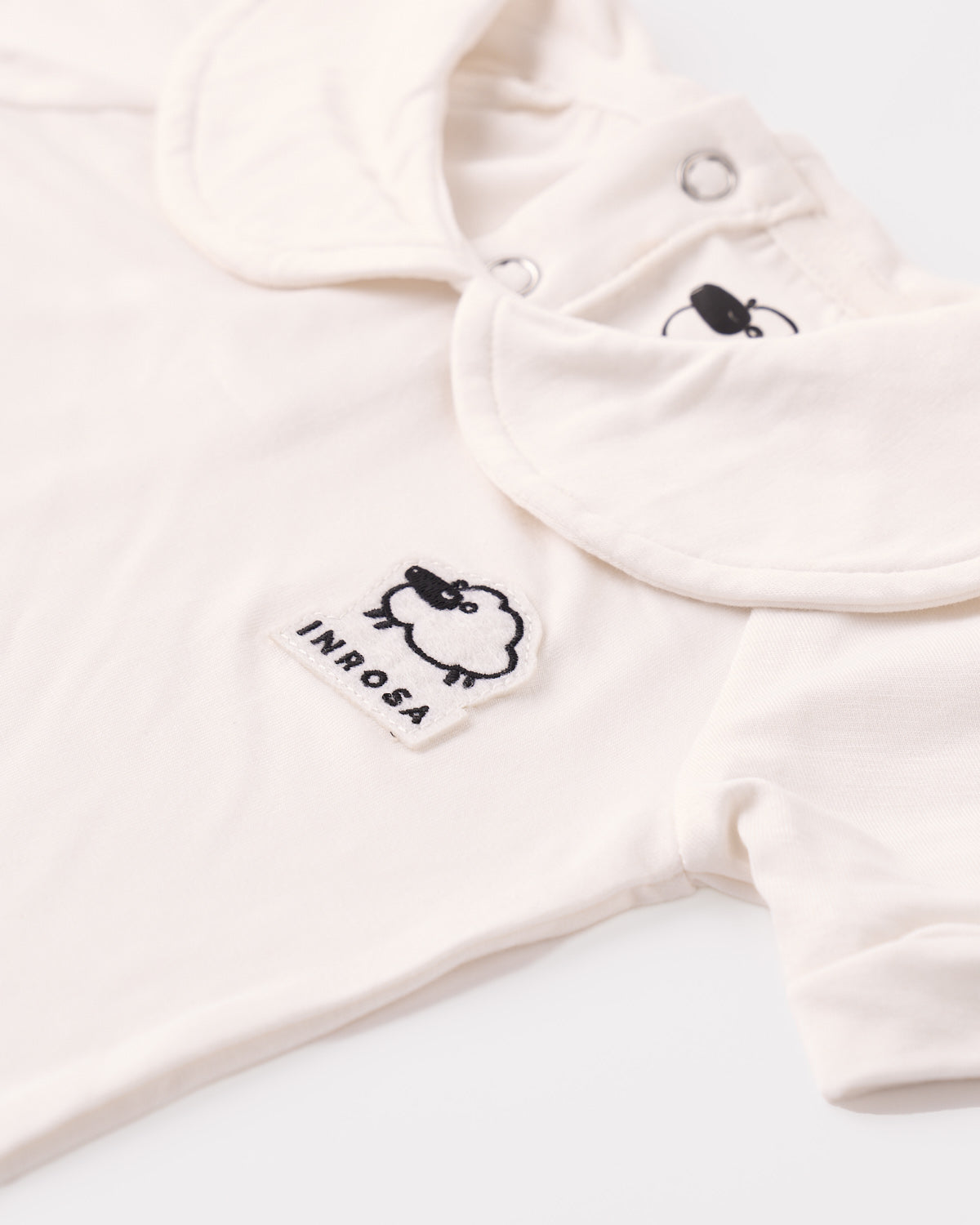 Tutina corta con colletto in bambù